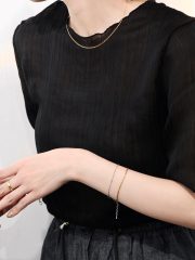 Black sheer pleated blouse